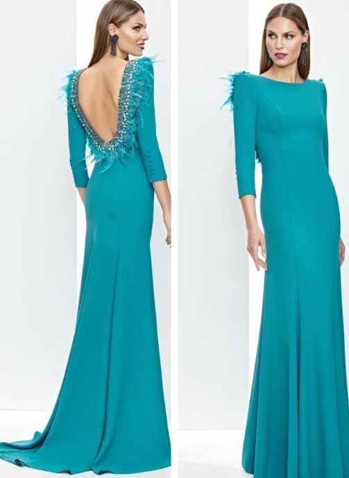 VESTIDO DE FIESTA LARGO CREP CON PLUMAS ESPALDA BAJA
