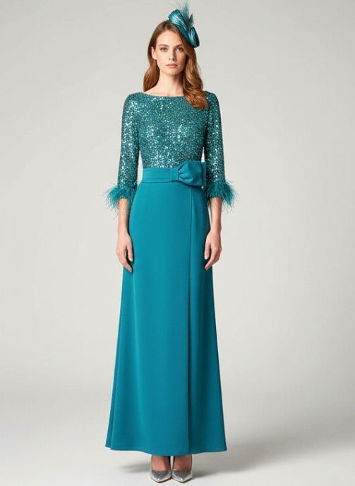 vestido largo de fiesta verde mar con plumas y pedreria invitada boda
